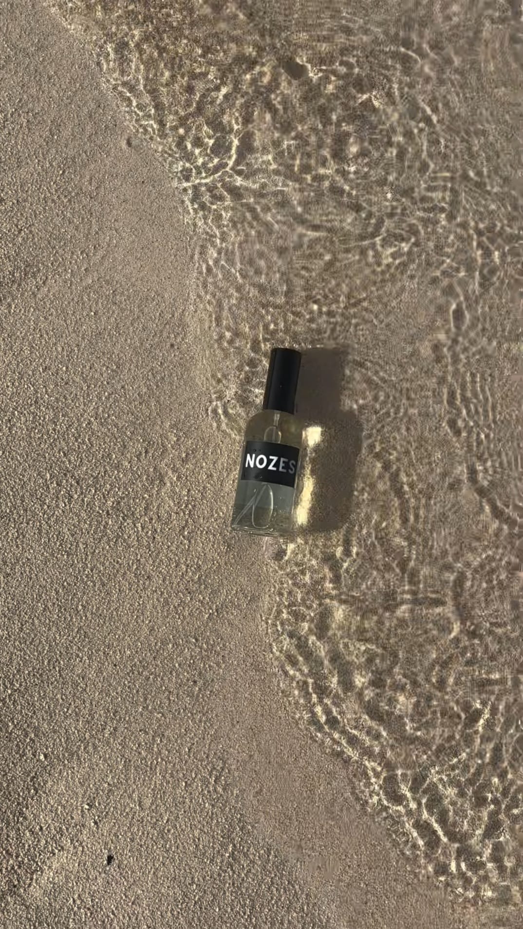 Nozes flesje op de waterlijn
